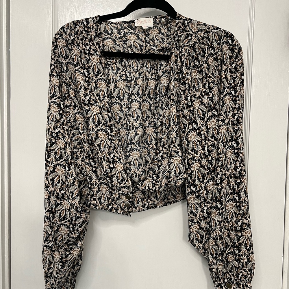 Deep v- neck blouse never worn, no tags